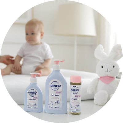 baby with sanosan care products and sani